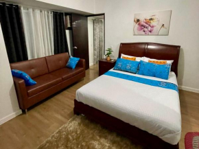 Abreeza 1BR Queen Suite - AC, Wifi, Netflix, Kitchen, Washer, Abreeza Mall